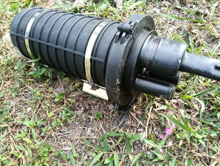 Aerial dome closure service loops for fibre optic service for internet close up on the ground. Photo taken in Malaysia.の写真素材