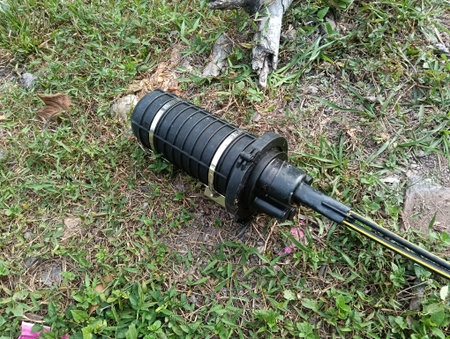 Aerial dome closure service loops for fibre optic service for internet close up fall on the ground . photo taken in malaysiaの写真素材