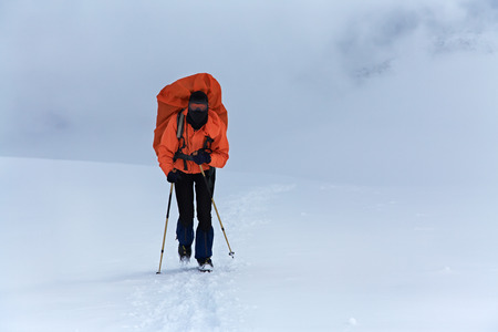 hiker in the mountain. Climb to the top. summer hiking