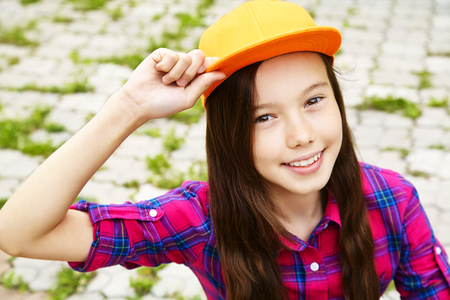 Beautiful smiling teenage girl in a summer park. youth lifestyleの写真素材