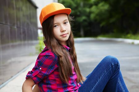 Beautiful smiling teenage girl in a summer park. youth lifestyleの写真素材