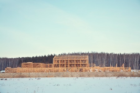 wooden frame ecological house being builtの写真素材