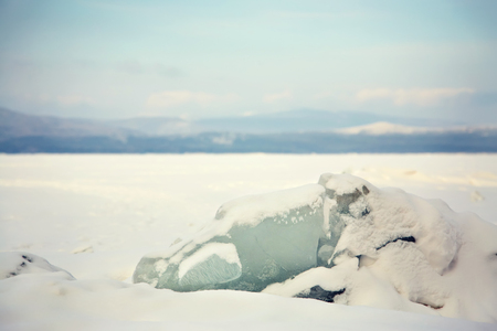 scenic winter landscape. view ice chunks with snowの写真素材
