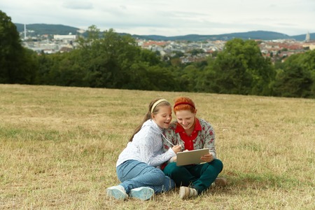 mother and daughter using a tablet computerの写真素材