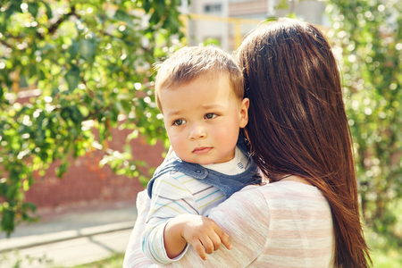 portrait of a young mother with baby. Mom and sonの写真素材