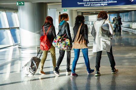 group of people in airport waiting roomのeditorial素材
