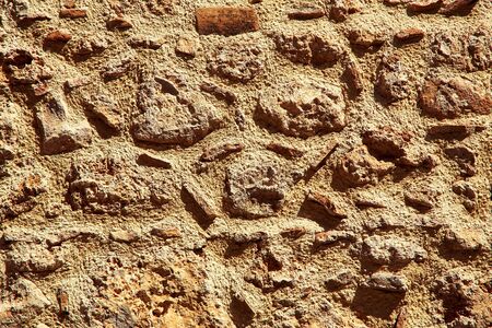 Old cracked brick wall. rough surface texture.の写真素材