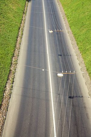motorway in a city. Empty road without cars. trolley wire.の写真素材