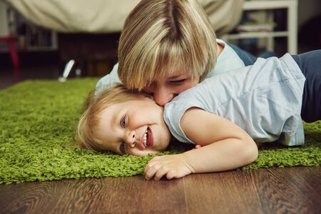mother and daughter. child and mom playing at home. motherhoodの写真素材