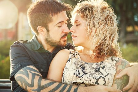closeup portrait of happy kissing couple in love. loving embracing man and woman.の写真素材