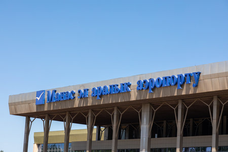 Bishkek, Kyrgyzstan - May 13, 2022: Closeup of Manas International Airport bannerのeditorial素材