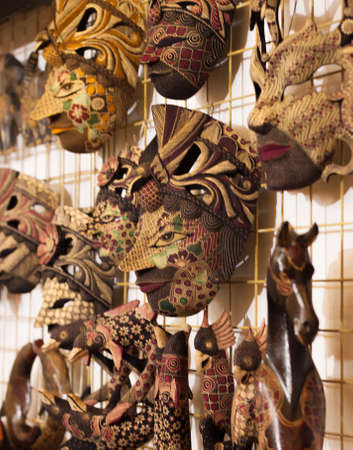 wooden mask painted with batik style hand made craftの写真素材