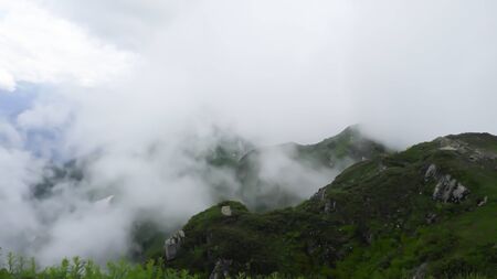 Snowwhite clouds in the mountains of Sochi. Vacation in Russia. Landscapeの写真素材
