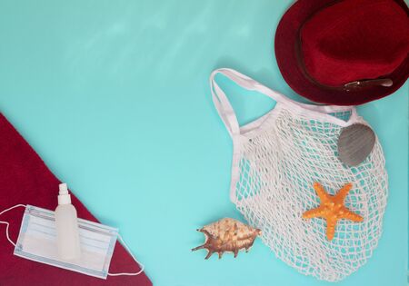 Vacation summer 2020. Mask antiseptic beach bag towel hat.の写真素材