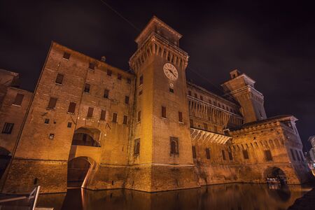 Estense Castle of Renaissance town of Ferrara, Italy, by nightのeditorial素材