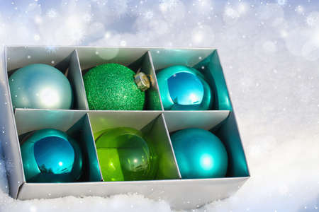 Colored Christmas balls in a boxの写真素材