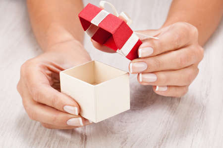 Gift box in female hands