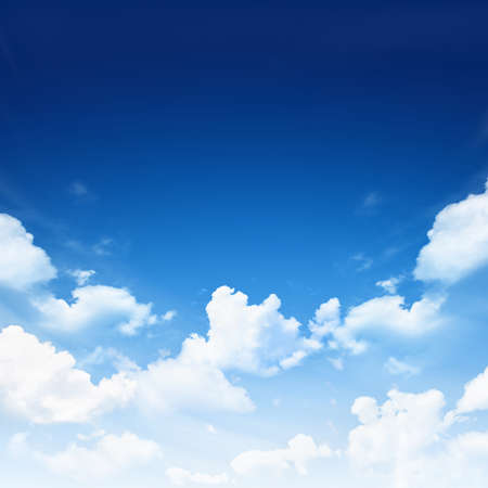 Blue sky with clouds backgroundの写真素材
