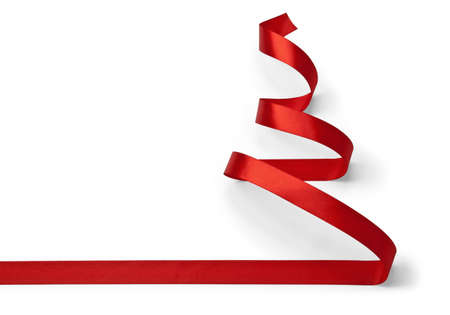 Christmas tree made of red ribbon isolated on whiteの写真素材
