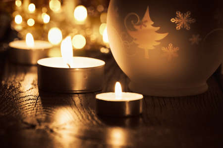 Christmas decoration with candles and bokeh effectの写真素材