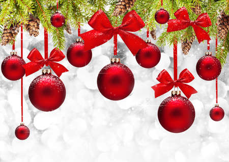 Christmas background with red balls and bowsの写真素材