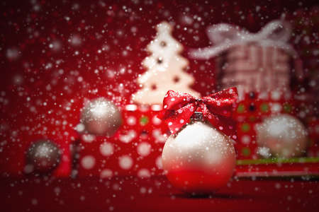 Christmas background with balls and red bowの写真素材