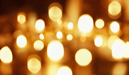 Background with golden bokeh effect. Abstract backgroundの写真素材