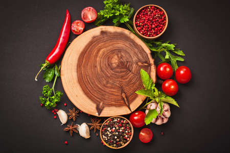 Spices and ingredients on wood backgroundの写真素材
