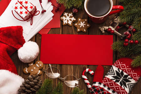 Christmas card and decoration on wooden backgroundの写真素材