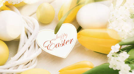 Easter decoration with yellow tulipsの写真素材