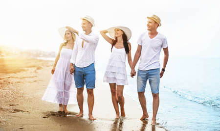 Happy friends on the beachの写真素材