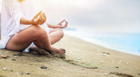 Closeup of womans hand meditatingの写真素材