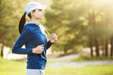 Young fitness woman running