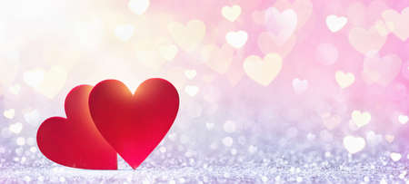 Abstract red hearts in sunlight