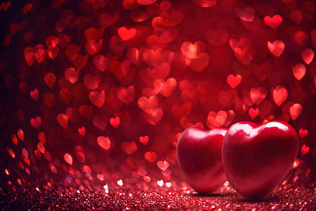 Valentines Day background. Glittering Effect With Red Bokehの写真素材