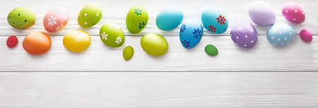 Easter Eggs on Wood Backgroundの写真素材