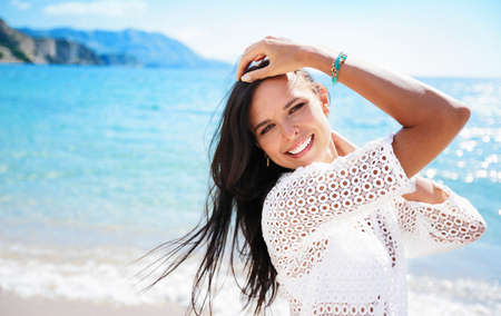 Beautiful Smiling Woman on Beachの写真素材