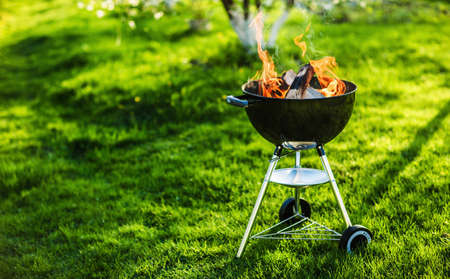 Barbecue Grill with Fire on Natureの写真素材