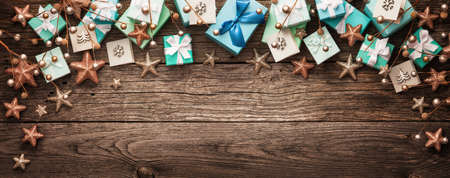 Christmas decorations and gifts on a wooden background