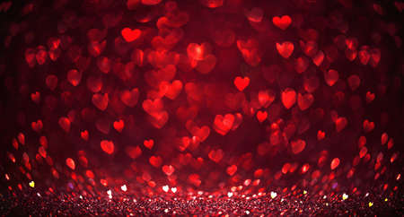 Red Glitter With Sparkle Of Lights And Hearts Bokeh Effectの写真素材