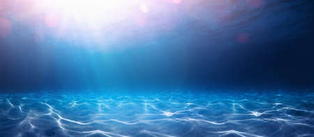 Blue Water Background and Sunlight Underwaterの写真素材