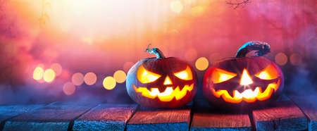 Halloween Background. Jack O Lanterns Glowing In Fantasy Night
