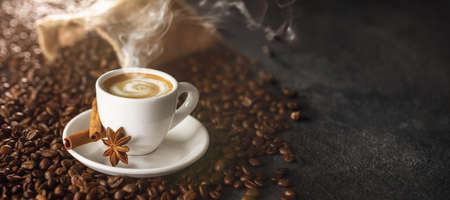 Coffee Cup With Beans On a Dark Backgroundの写真素材