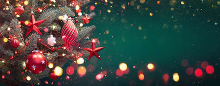 Christmas tree with decorations and glitter. Winter Holiday Backgroundの写真素材