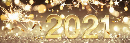 Happy New Year 2021. Golden Background with Sparklers and Confettiの写真素材
