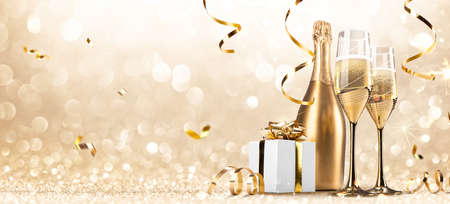 New Years Eve Celebration with Champagne and Confettiの写真素材