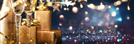 New Years Eve Celebration with Champagne and Confettiの写真素材