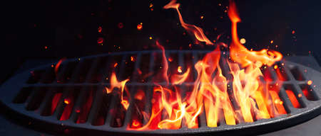BBQ Grill With Bright Flames And Glowing Coalsの写真素材