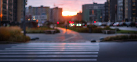 Evening city at sunset with blur effectの写真素材