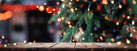Christmas background with fir tree and illumination lightsの写真素材